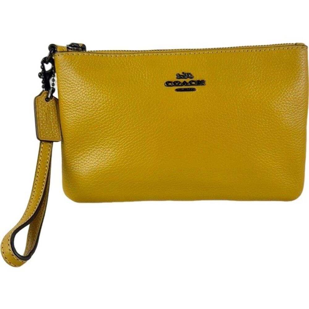 Coach Pebbled Leather Wristlet in Mustard Yellow